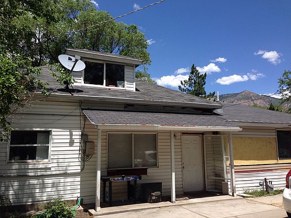Front of house - no front yard to maintain, 