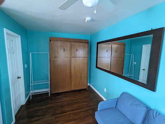 bed area with murphy bed up