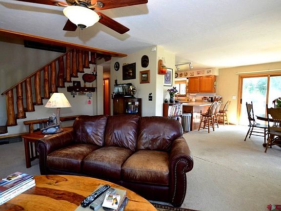 Open living room with abundant natural light.