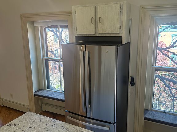 Kitchen view of three North facing windows.
