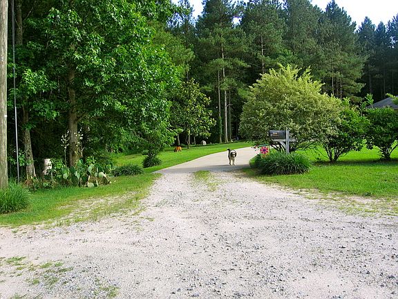 State maintained dirt road to property.
						:
						0.7 of a mile long