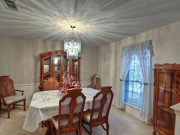 This Formal Dining Room Opens to the Formal Living Room - A Perfect Arrangement for Entertaining!
