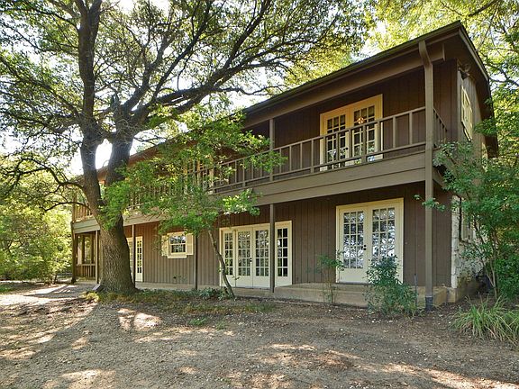 back of house - now has lush, green grass established
