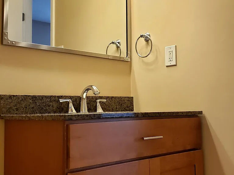 Master Bathroom with upgraded fixtures and granite counters