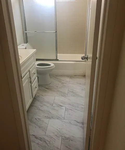 full bath new floor and bathand vanity
