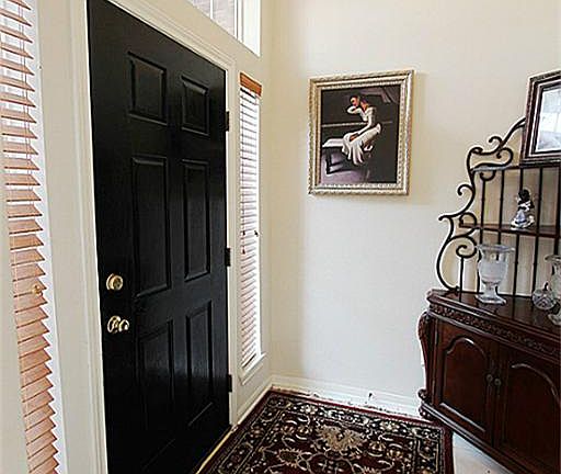 ENTRY WITH TILE FLOORS.