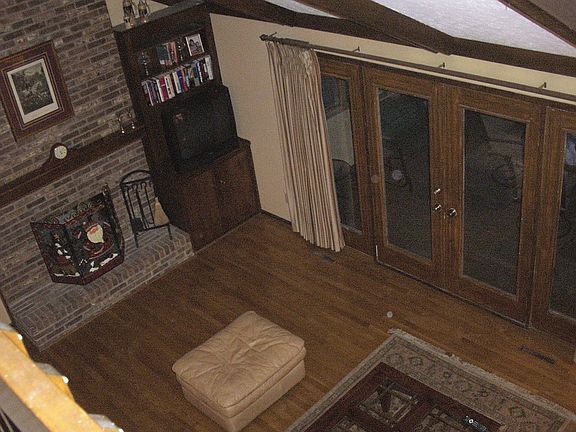 13'4 X 20'4 FAMILY ROOM W/ FIREPLACE, WET BAR AND STEPS TO LOFT