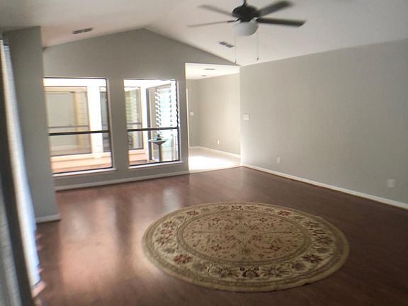 Living room. Looking at atrium and foyer.
