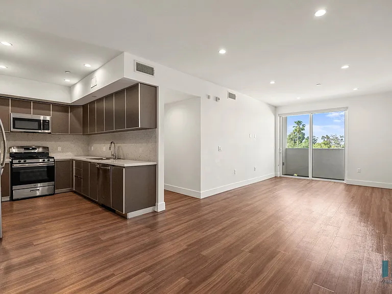 Open-Concept Kitchen, Dining, and Living Room Area