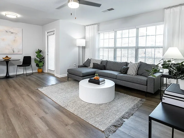 Immerse yourself in boundless delight within our expansive living rooms and bask in the abundant natural light that pours through a wall of sunlit windows. Embrace the joy and elevate your living experience at Market 1900.