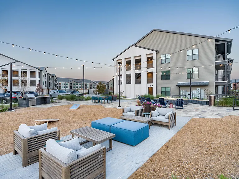 Thoughtfully designed outdoor spaces including a Beer Garden at Modera McKinney Ridge create a welcoming setting for relaxed gatherings day or night.