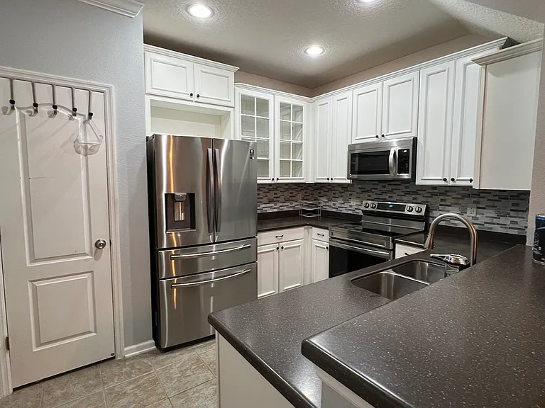 Kitchen with pantry door