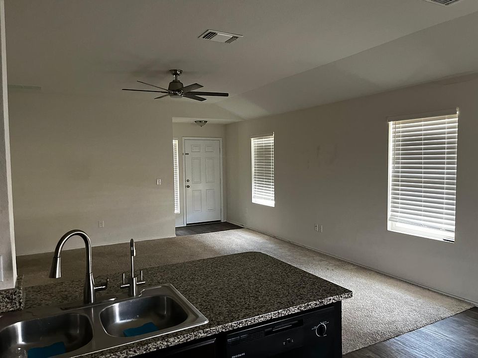 KITCHEN VIEW TO LIVING ROOM.