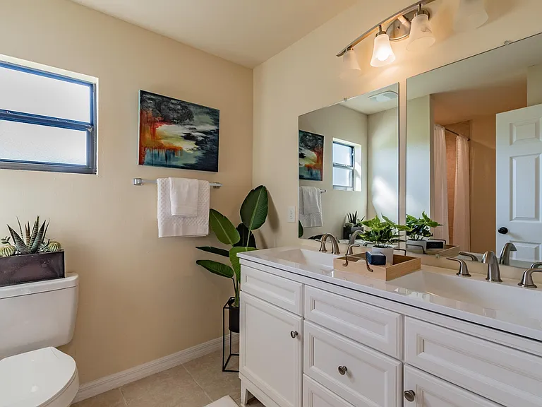 Digitally staged Primary Bathroom