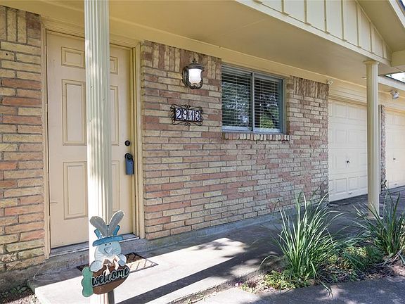 Enjoy your new neighborhood from this charming front porch!