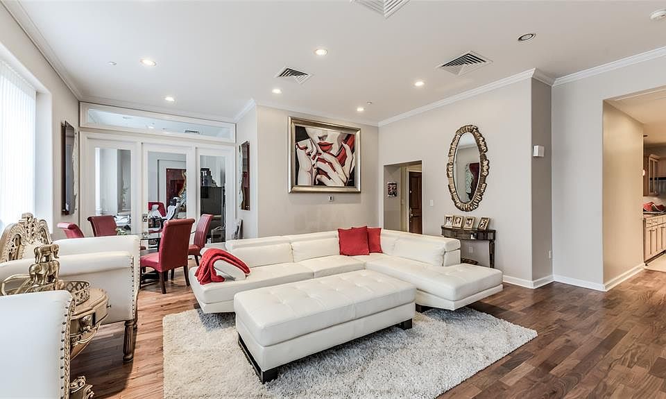 Amazing 2 bedroom with a study in Commerce Towers with amazing views. Standing in the living area the study is to the left through the glass door and the kitchen is to the right.