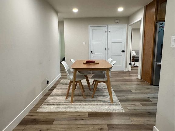 Cozy dining space conveniently located next to the kitchen ideal for family meals and entertaining