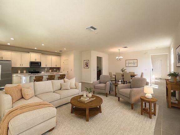 Modern DeLeon new construction home with stucco and stone exterior in Clermonts Ridgeview community