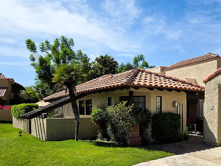 Private gated front entry court. Driveway has ample off-street parking for 2 vehicles.