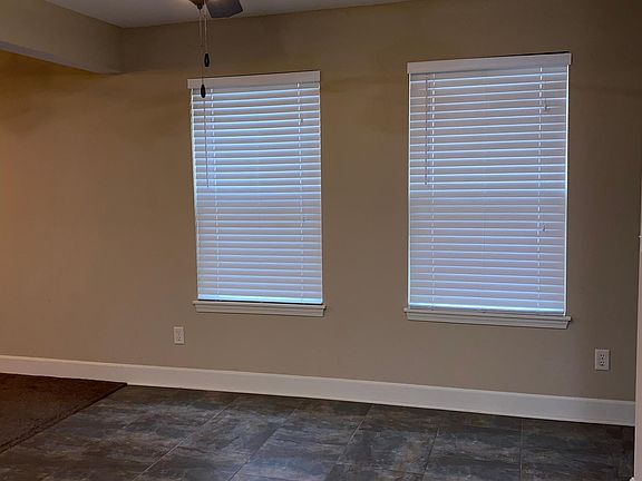 Windows in kitchen eating area.