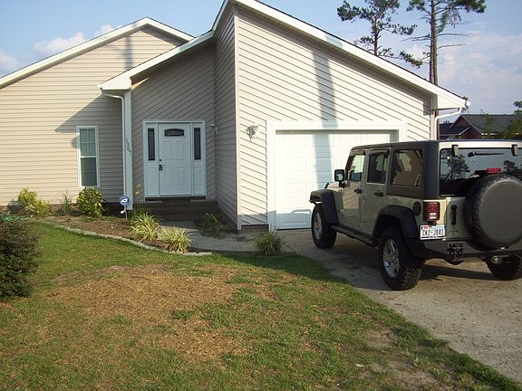 New front door and decorative siding