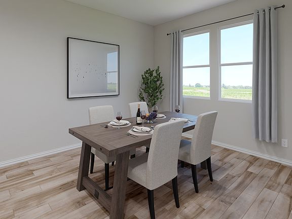 Enjoy family dinners around the dining table.