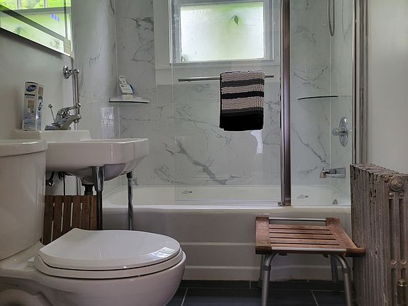 NEW powder room completed in June 2024. Sunny, tiled and toasty warm in winter.