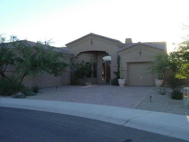 3 car garage. paver driveway