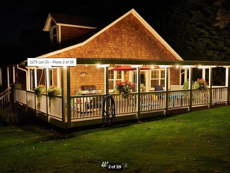 Large deck with new covered portion for outside grilling and entertaining