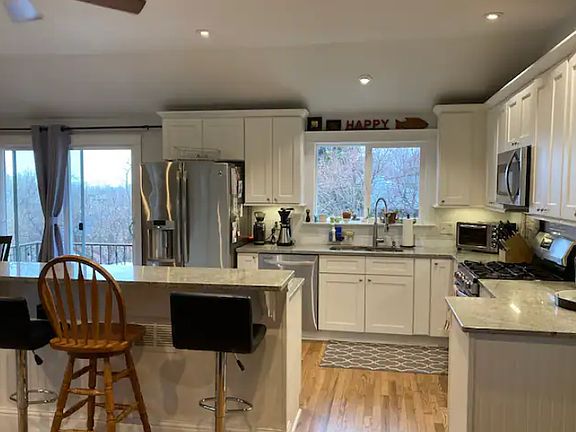 Large open concept kitchen with high celings & lots of light.