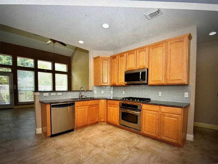8911 Silent Willow Ln — Photo 16