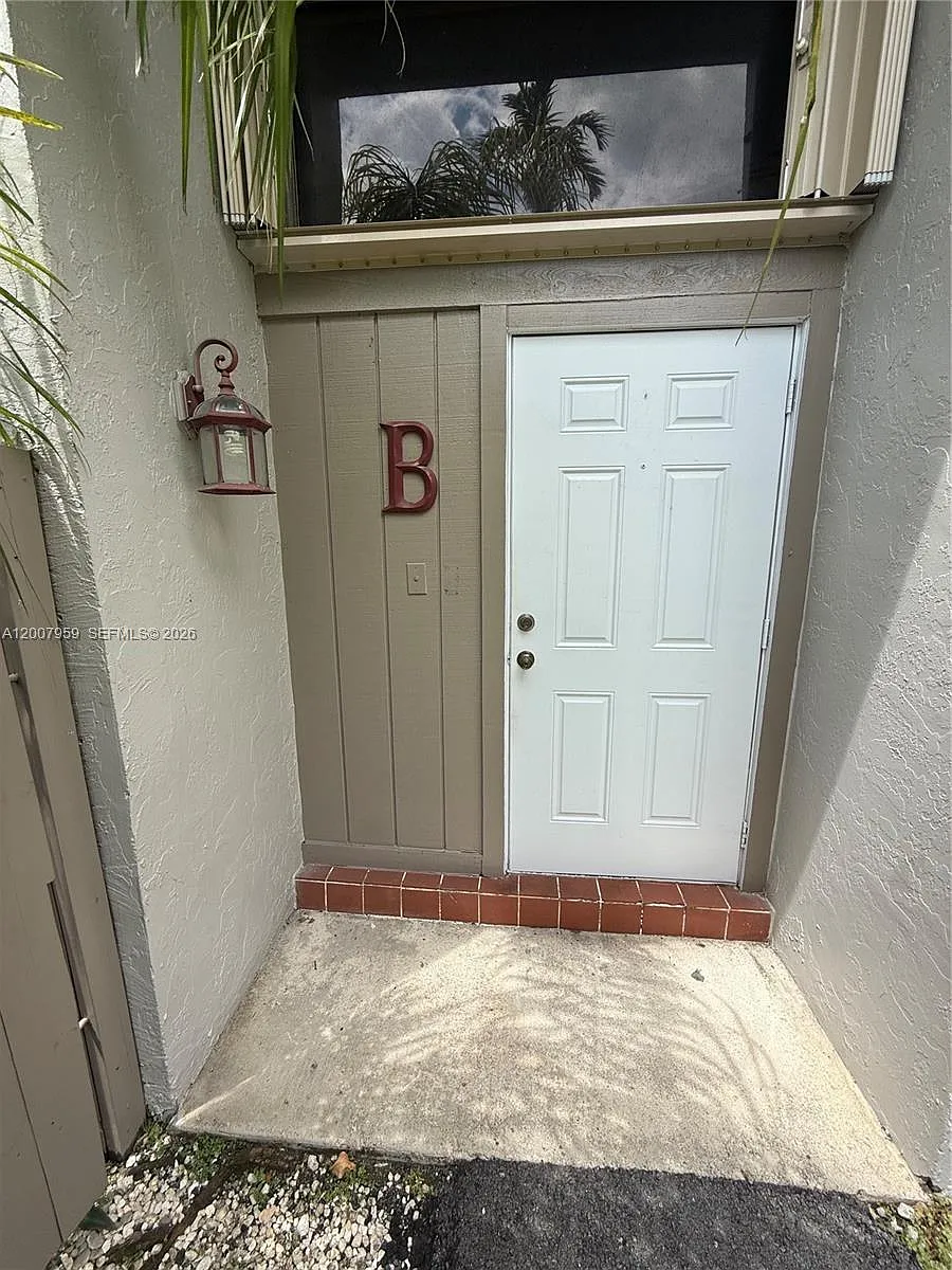 Photo 2 of 54 - 10661 SW 113th Pl #94B - Miami, FL Building Photo - 10661 SW 113th Pl #94B