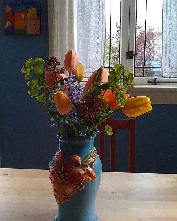 kitchen breakfast nook with flowers from the garden