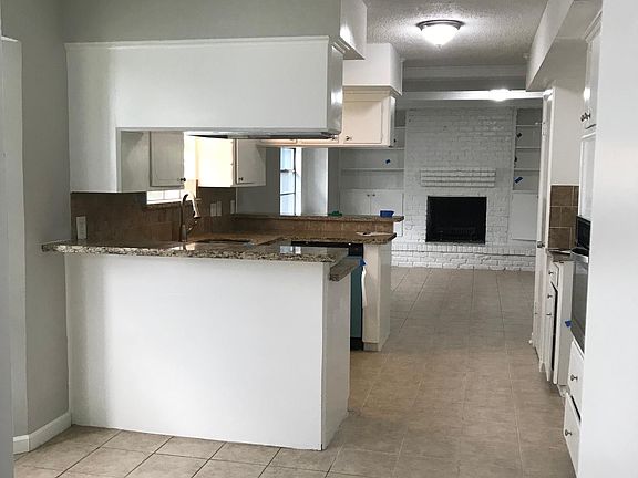 Kitchen is in a central location between dining room and family room. Great for entertaining!