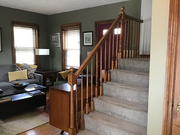 Stairs lead to the bedroom and bathroom on the upper level.