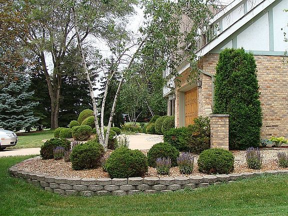 Attached garrage and landscaping