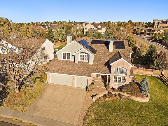 Front View reflecting large Corner lot, landscaping, Solar Panel Integration