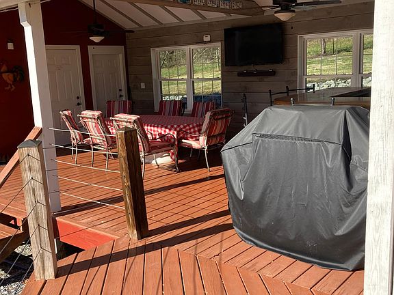 Outdoor dining area with weber grill