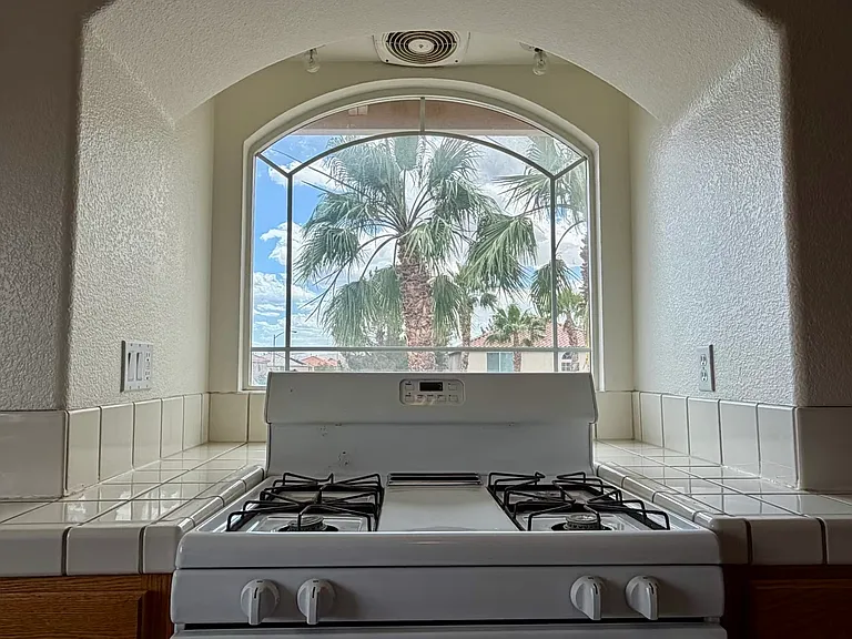 Kitchen stove with a bright window view