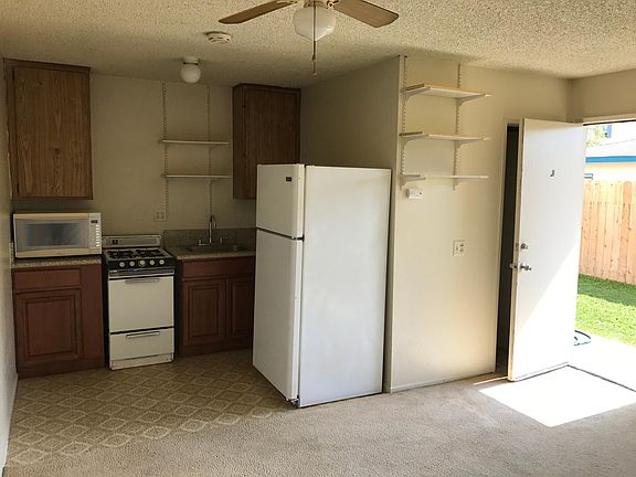 full size refrigerator, microwave, stove, no dishwasher