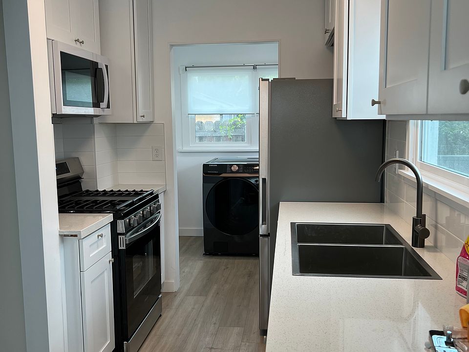 New Renovated Kitchen with New Refrigerator and New Washer/Dryer, New Stove. Lots of Storage. Breakfast nook.