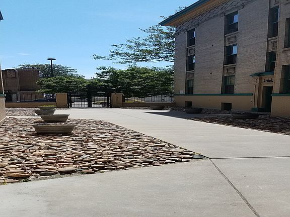 Experience serenity in this charming courtyard, perfect for peaceful relaxation.