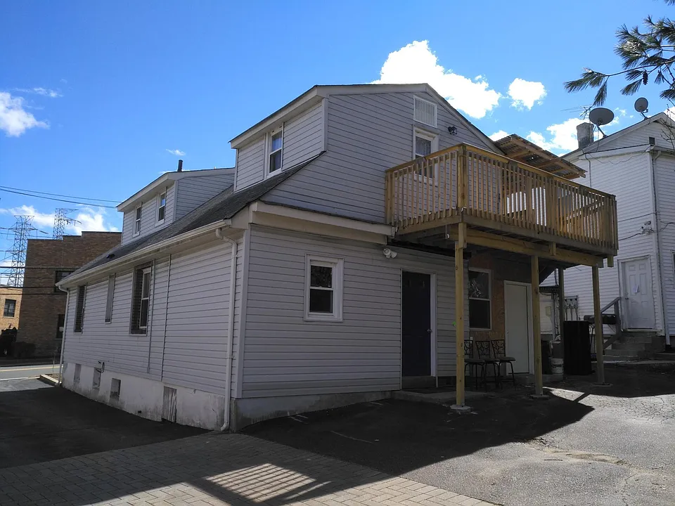 Back door entrance, 2 parking spots