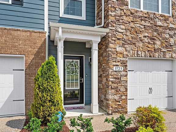 Covered Porch to the main entrance with Storm Door