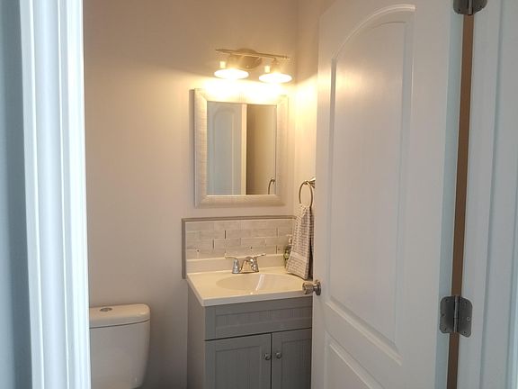 Half bath located just off the living room