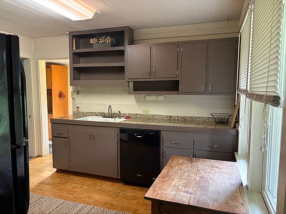 Kitchen, looking toward entry
