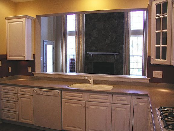 Kitchen opening to Family