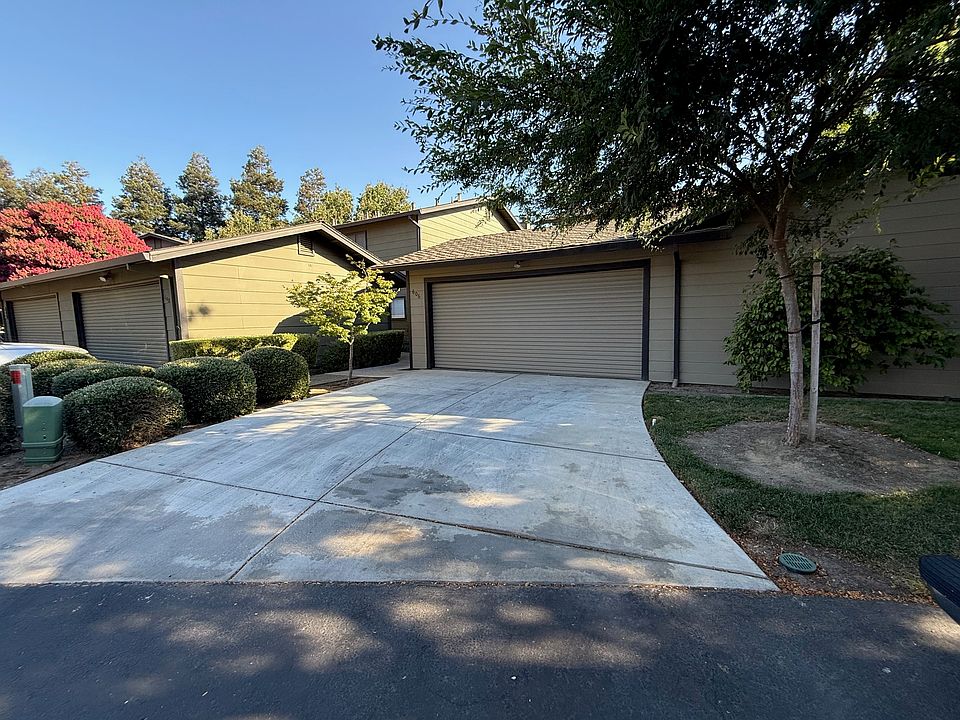 Driveway leading to 2-car garage
