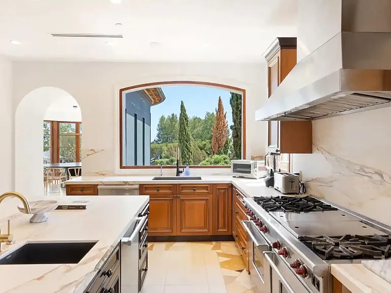 Luxurious kitchen with a stunning view from the counter.