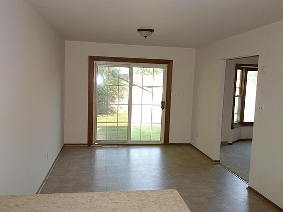 Dining area - connected to kitchen. Sliding door to back yard.